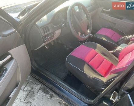 Черный ВАЗ 2172 Priora, объемом двигателя 1.6 л и пробегом 130 тыс. км за 2000 $, фото 16 на Automoto.ua