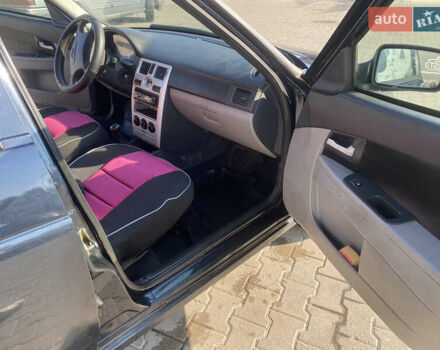 Черный ВАЗ 2172 Priora, объемом двигателя 1.6 л и пробегом 130 тыс. км за 2000 $, фото 23 на Automoto.ua