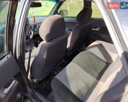 ВАЗ 2172 Priora 2009 в Новом Буге на Automoto.ua Черный ВАЗ 2172 Priora, объемом двигателя 1.6 л и пробегом 340 тыс. км за 2560 $, фото 10 на Automoto.ua