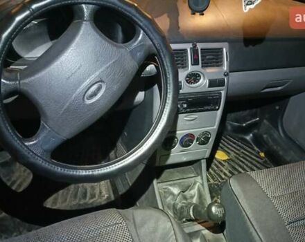 Черный ВАЗ 2172 Priora, объемом двигателя 1.6 л и пробегом 148 тыс. км за 1800 $, фото 1 на Automoto.ua