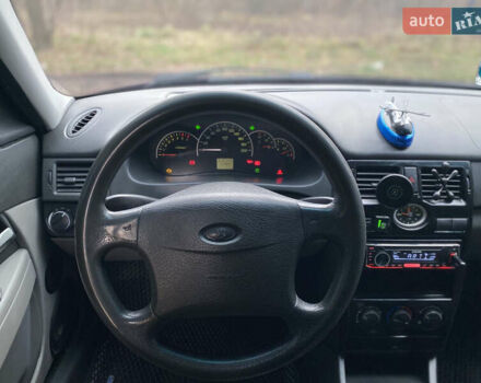 Красный ВАЗ 2172 Priora, объемом двигателя 1.6 л и пробегом 210 тыс. км за 2150 $, фото 13 на Automoto.ua