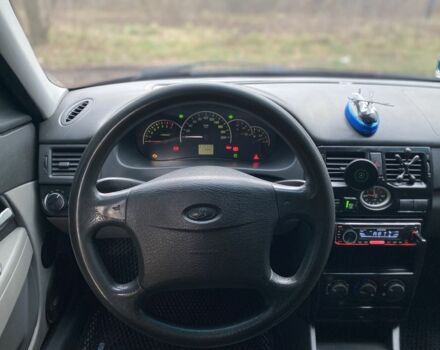 Красный ВАЗ 2172 Priora, объемом двигателя 1.6 л и пробегом 210 тыс. км за 2150 $, фото 4 на Automoto.ua