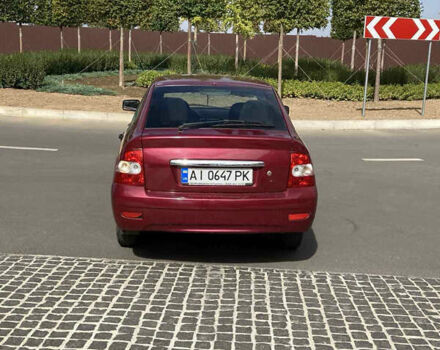 Красный ВАЗ 2172 Priora, объемом двигателя 1.6 л и пробегом 100 тыс. км за 2100 $, фото 6 на Automoto.ua