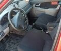 Красный ВАЗ 2172 Priora, объемом двигателя 1.6 л и пробегом 230 тыс. км за 1800 $, фото 1 на Automoto.ua