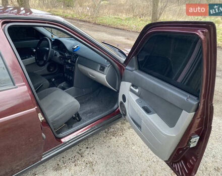 Красный ВАЗ 2172 Priora, объемом двигателя 1.6 л и пробегом 210 тыс. км за 2150 $, фото 11 на Automoto.ua