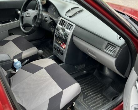 Красный ВАЗ 2172 Priora, объемом двигателя 1.6 л и пробегом 220 тыс. км за 1100 $, фото 12 на Automoto.ua