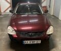 Красный ВАЗ 2172 Priora, объемом двигателя 1.6 л и пробегом 350 тыс. км за 1004 $, фото 1 на Automoto.ua