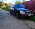Красный ВАЗ 2172 Priora, объемом двигателя 1.6 л и пробегом 210 тыс. км за 2350 $, фото 1 на Automoto.ua