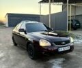 Червоний ВАЗ 2172 Priora, об'ємом двигуна 1.6 л та пробігом 252 тис. км за 3650 $, фото 1 на Automoto.ua
