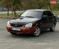 Красный ВАЗ 2172 Priora, объемом двигателя 1.6 л и пробегом 180 тыс. км за 1950 $, фото 1 на Automoto.ua