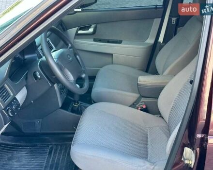 Красный ВАЗ 2172 Priora, объемом двигателя 1.6 л и пробегом 152 тыс. км за 2900 $, фото 1 на Automoto.ua
