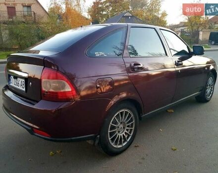 Красный ВАЗ 2172 Priora, объемом двигателя 1.6 л и пробегом 220 тыс. км за 3900 $, фото 1 на Automoto.ua