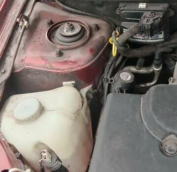 Красный ВАЗ 2190 Гранта, объемом двигателя 1.6 л и пробегом 155 тыс. км за 2550 $, фото 7 на Automoto.ua