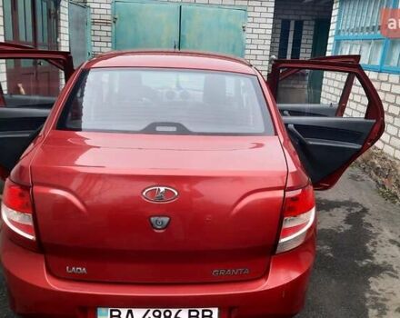 Красный ВАЗ 2190 Гранта, объемом двигателя 1.6 л и пробегом 245 тыс. км за 3100 $, фото 1 на Automoto.ua