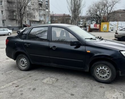 Черный ВАЗ Гранта, объемом двигателя 1.6 л и пробегом 257 тыс. км за 2750 $, фото 2 на Automoto.ua