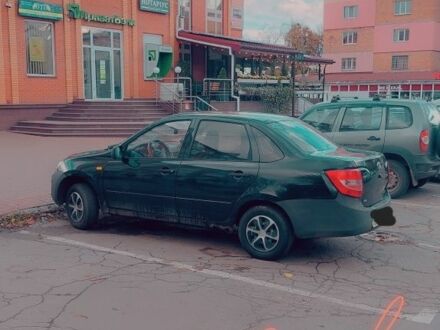 Чорний ВАЗ Гранта, об'ємом двигуна 1.5 л та пробігом 174 тис. км за 1800 $, фото 1 на Automoto.ua