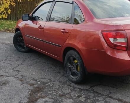 ВАЗ Гранта 2013 у Хороле на Automoto.ua Червоний ВАЗ Гранта, об'ємом двигуна 1.6 л та пробігом 175 тис. км за 2650 $, фото 5 на Automoto.ua