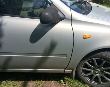 Бежевий ВАЗ Калина, об'ємом двигуна 1.6 л та пробігом 100 тис. км за 2000 $, фото 6 на Automoto.ua