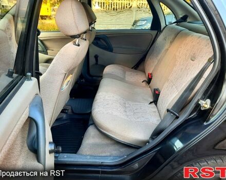 Черный ВАЗ Kalina, объемом двигателя 1.4 л и пробегом 128 тыс. км за 2850 $, фото 10 на Automoto.ua