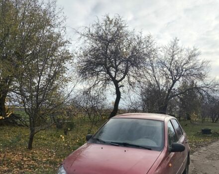 Красный ВАЗ Калина, объемом двигателя 1.6 л и пробегом 130 тыс. км за 1000 $, фото 5 на Automoto.ua