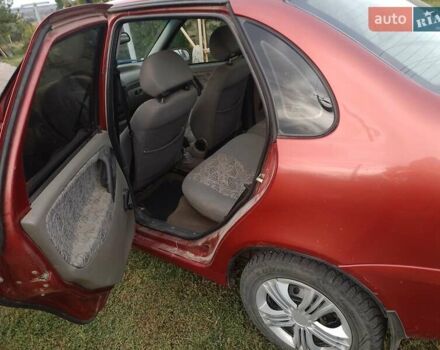 Красный ВАЗ Калина, объемом двигателя 1.6 л и пробегом 120 тыс. км за 1800 $, фото 26 на Automoto.ua