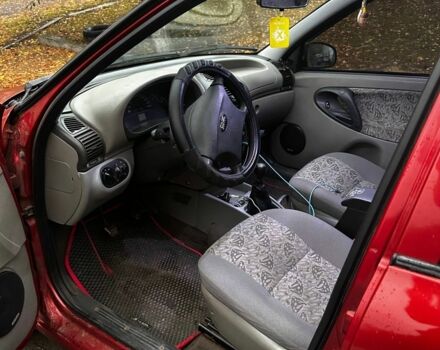 Красный ВАЗ Калина, объемом двигателя 1.6 л и пробегом 150 тыс. км за 2200 $, фото 7 на Automoto.ua