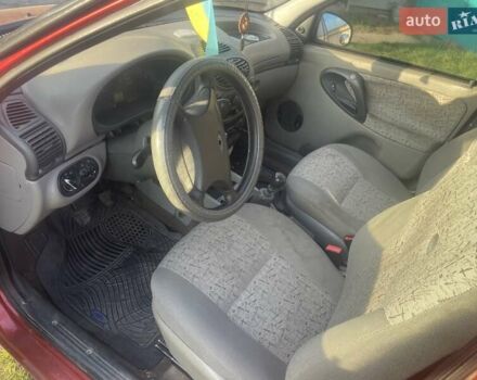 Красный ВАЗ Калина, объемом двигателя 1.6 л и пробегом 150 тыс. км за 1200 $, фото 5 на Automoto.ua