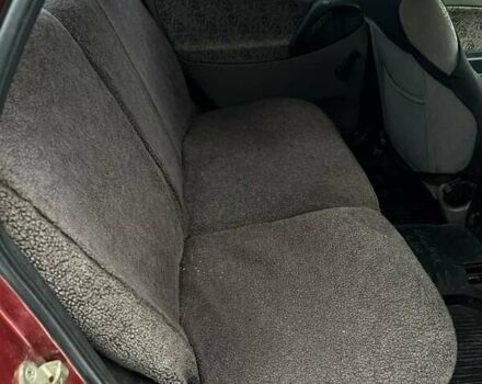 Красный ВАЗ Калина, объемом двигателя 1.6 л и пробегом 168 тыс. км за 3500 $, фото 6 на Automoto.ua