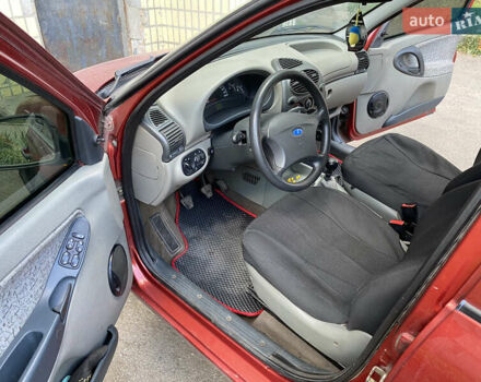 Красный ВАЗ Калина, объемом двигателя 1.6 л и пробегом 145 тыс. км за 2200 $, фото 5 на Automoto.ua