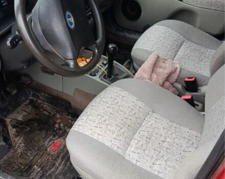 Красный ВАЗ Калина, объемом двигателя 1.6 л и пробегом 150 тыс. км за 2500 $, фото 6 на Automoto.ua