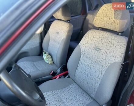 Красный ВАЗ Калина, объемом двигателя 1.6 л и пробегом 170 тыс. км за 1490 $, фото 11 на Automoto.ua