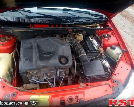 Красный ВАЗ Kalina, объемом двигателя 1.6 л и пробегом 120 тыс. км за 2250 $, фото 10 на Automoto.ua