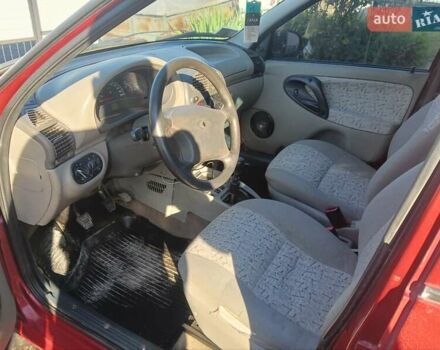 Красный ВАЗ Калина, объемом двигателя 1.6 л и пробегом 233 тыс. км за 1800 $, фото 14 на Automoto.ua
