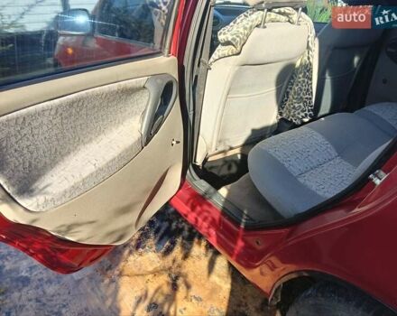 Красный ВАЗ Калина, объемом двигателя 1.6 л и пробегом 233 тыс. км за 1800 $, фото 15 на Automoto.ua