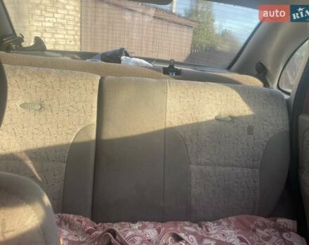 Красный ВАЗ Калина, объемом двигателя 1.6 л и пробегом 150 тыс. км за 1200 $, фото 1 на Automoto.ua