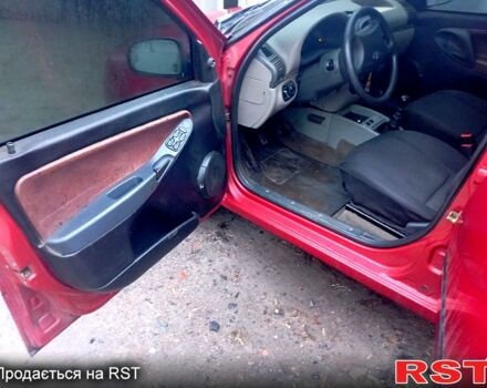 Красный ВАЗ Kalina, объемом двигателя 1.5 л и пробегом 205 тыс. км за 1800 $, фото 6 на Automoto.ua
