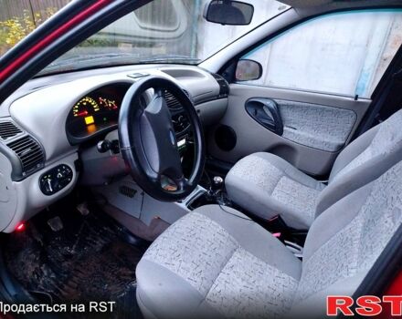 Красный ВАЗ Kalina, объемом двигателя 1.6 л и пробегом 100 тыс. км за 2100 $, фото 5 на Automoto.ua