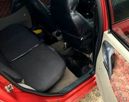 Червоний ВАЗ Kalina, об'ємом двигуна 1.6 л та пробігом 197 тис. км за 2350 $, фото 9 на Automoto.ua