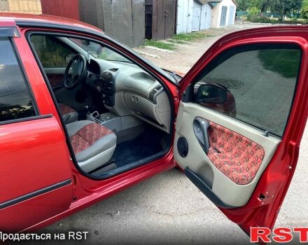 Красный ВАЗ Kalina, объемом двигателя 1.6 л и пробегом 220 тыс. км за 2299 $, фото 9 на Automoto.ua