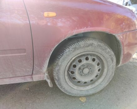 Красный ВАЗ Калина, объемом двигателя 1.4 л и пробегом 196 тыс. км за 1250 $, фото 4 на Automoto.ua