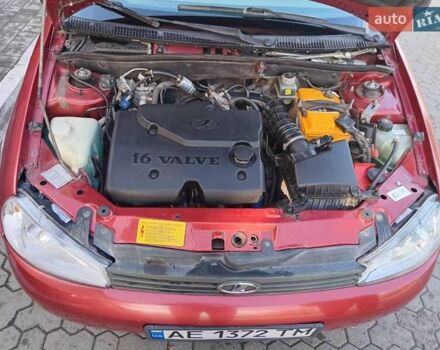 Красный ВАЗ Калина, объемом двигателя 1.39 л и пробегом 117 тыс. км за 2800 $, фото 1 на Automoto.ua