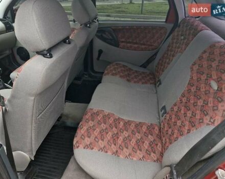 Красный ВАЗ Калина, объемом двигателя 1.4 л и пробегом 109 тыс. км за 3499 $, фото 22 на Automoto.ua