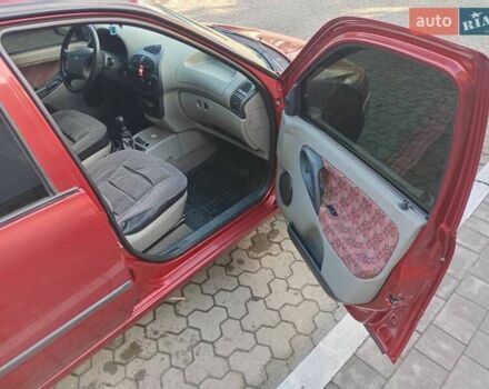 Красный ВАЗ Калина, объемом двигателя 1.39 л и пробегом 117 тыс. км за 2800 $, фото 6 на Automoto.ua