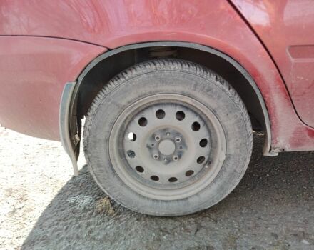 Красный ВАЗ Калина, объемом двигателя 1.4 л и пробегом 196 тыс. км за 1250 $, фото 5 на Automoto.ua