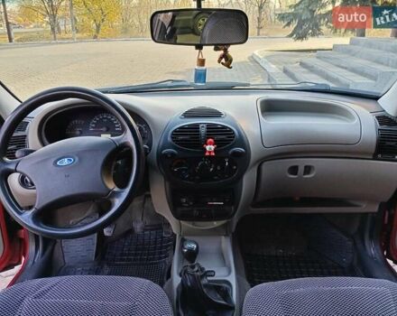 Красный ВАЗ Калина, объемом двигателя 1.39 л и пробегом 117 тыс. км за 2800 $, фото 4 на Automoto.ua