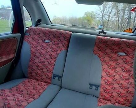 Красный ВАЗ Калина, объемом двигателя 1.39 л и пробегом 118 тыс. км за 2800 $, фото 5 на Automoto.ua