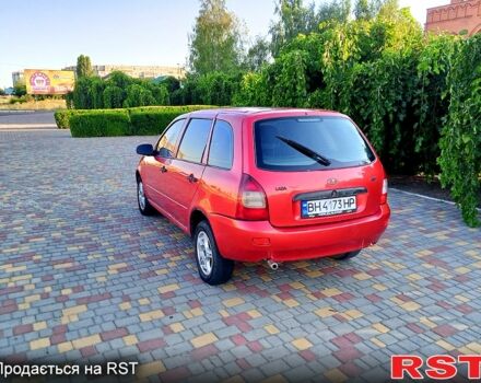 Красный ВАЗ Kalina, объемом двигателя 1.6 л и пробегом 200 тыс. км за 1350 $, фото 1 на Automoto.ua
