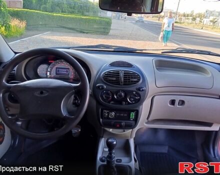 Красный ВАЗ Kalina, объемом двигателя 1.6 л и пробегом 200 тыс. км за 1350 $, фото 7 на Automoto.ua