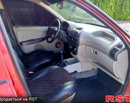 Красный ВАЗ Kalina, объемом двигателя 1.6 л и пробегом 200 тыс. км за 1350 $, фото 6 на Automoto.ua