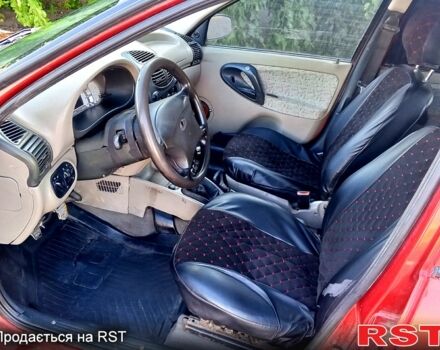 Красный ВАЗ Kalina, объемом двигателя 1.6 л и пробегом 200 тыс. км за 1350 $, фото 5 на Automoto.ua